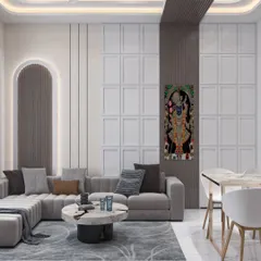 This living room combines modern paneling with traditional art. The neutral-toned sectional sofa and minimalist coffee table create a calm foundation, allowing the vibrant artwork to be the focal point.