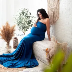 A solo portrait is a must. This mama chose a gorgeous royal blue mermaid gown from my collection, and she looks absolutely radiant in my boho-themed studio setup.