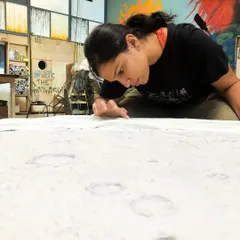 Here I am, completely absorbed in creating the textured surface of my moon sculpture. This work-in-progress shot captures the focus and hands-on detail that goes into every piece. I'm clearly over the moon!