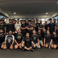 The team after a game-changing seminar on cage wrestling with Coach Eliot Kelly. The learning never stops.