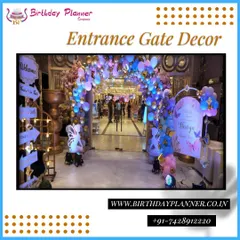 This is an example of a high-impact entrance we built for a major celebration. The design incorporates a multi-layered balloon arch, custom-lit signage, themed props, and directional signs to guide guests into the main event area.