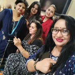 A candid moment with fellow female advocates during a meeting. It highlights the camaraderie and supportive network of women in the legal profession.