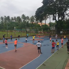 A group warm-up session on the basketball court. We use varied environments to keep training dynamic and engaging for our athletes.