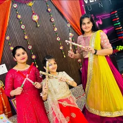 Look at these three dancers, all dressed up and ready for our Navratri celebration. Holding their dandiya sticks, they are all smiles, showing how much fun it is to celebrate our culture through dance and fitness.