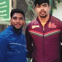 A photo with 'The High Flyer' himself, Pawan Sehrawat. Meeting their heroes motivates our players to dream big.