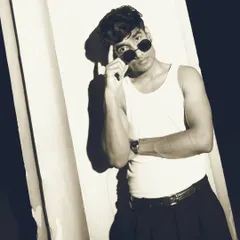 An interactive pose, adjusting the sunglasses. This adds a touch of personality and story to the stylized, high-fashion shot.