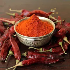 This is the heart of Andhra spice, my Guntur Red Chilli powder. The chillies come from our own farm, so they are completely chemical-free and full of natural, fiery flavor. I can adjust the spice level for you on request.