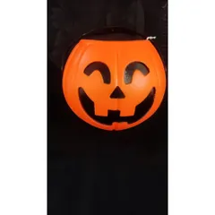 The classic jack-o'-lantern candy basket. This simple, smiling pumpkin pail is a Halloween essential for every trick-or-treater.