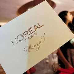 A close-up of the personalized card I created for Navya Nanda at the L'Oréal event. The simple elegance of calligraphy adds a layer of luxury and thoughtfulness to the brand's gift.