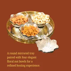 A round mirrored tray paired with four elegant floral nut bowls. This set offers a refined hosting experience, perfect for serving snacks during a pre-wedding function.