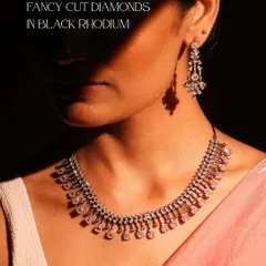 For the bride who dares to be different, I crafted this bold necklace and earring set. By setting fancy cut diamonds in black rhodium, I created a dramatic contrast that is both modern and undeniably sophisticated. This set is designed to make an unforgettable statement.