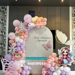 I designed this elegant butterfly theme for Noor Fatima's Aqeeqah ceremony. The soft pastel balloons in shades of pink, purple, and white, along with sparkling starbursts, create a dreamy and delicate backdrop for welcoming your little one.