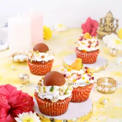 My fusion cupcakes are a perfect bite-sized treat for festivals. This photo shows my Gulab Jamun and Kesar Peda cupcakes, which combine the flavours of traditional Indian sweets with soft, fluffy cupcakes.