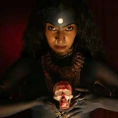 Part of a deeply personal series exploring the divine feminine through the iconography of Goddess Kali. This shot focuses on raw power and symbolism, using dramatic, low-key lighting to create a sense of reverence and intensity.