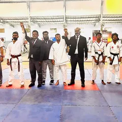 A moment of victory for our team during the team kumite event. Standing with my fellow competitors and officials, united by our shared passion for karate.