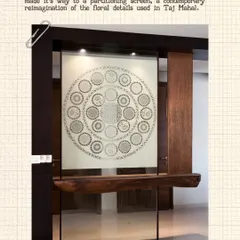 We drew inspiration from the traditional craft of Sanjhi, the art of paper cutting, to create this contemporary partitioning screen. The design is a modern reinterpretation of the floral details found in the Taj Mahal, rendered in frosted glass.