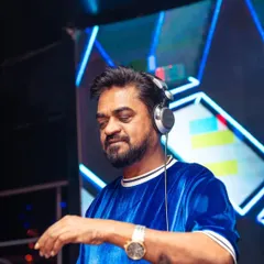 In the zone. This is my office, where I mix tracks and read the crowd to create an unforgettable night. Whether it's a club in Bangalore or a private party in Hyderabad, my focus is always on the music.