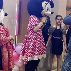 Here is our Minnie Mouse mascot interacting with guests at a Barbie-themed birthday party. Our character performers know how to engage with children and add to the party's theme.