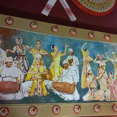 A close-up of one of the large paintings I created for the pandal, depicting traditional Assamese Bihu dancers and musicians.