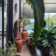 A work-in-progress shot from our gorgeous site in Wayanad. Here, we used a whole lot of large, handmade terracotta pots to embrace slow living, natural textures, and timeless design.