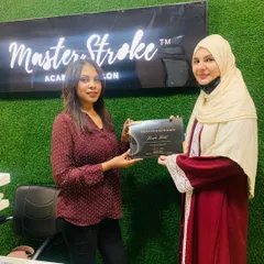 Here is another student receiving her certification. I believe in empowering every individual to build their own success story, and providing official certification is a key part of that process.