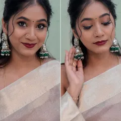 Another angle of this beautiful party look. The focus is on the glowing skin and the statement silver and green jhumkas.
