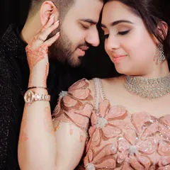 A close-up, intimate portrait from a Roka ceremony. I focus on the details, like the henna on her hands and the soft expressions, to tell a deeper story.
