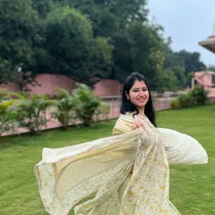 A smile and a spin. In my workshops, we learn the basics of folk dance, focusing on posture, grace, and the joy of movement that defines styles like Rajasthani folk and Garba.