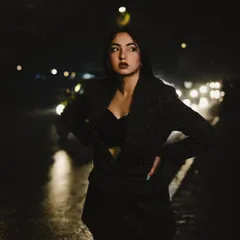 All black for the ones that lost me. A powerful night portrait on the street with beautiful bokeh from the car lights, shot by Eezome Productions.