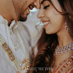 The easiest 'yes' ever. In this quiet, close moment, I see a whole universe of promises and smiles. It’s these gentle, unspoken connections that I love to frame, turning a simple glance into a timeless memory.