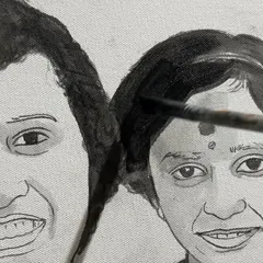A close-up of the brushwork on the four-generation family portrait, highlighting the details in the faces.