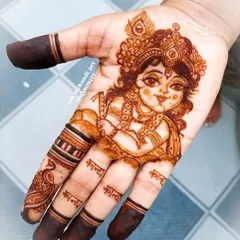 A special design created for Janmashtami, featuring a portrait of the child form of Lord Krishna, complete with his flute and peacock feather.