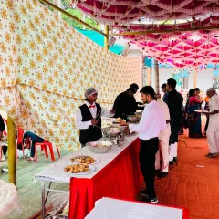A classic outdoor buffet setup for a wedding in Pen, Maharashtra. Even for simpler setups, my staff is in uniform to provide professional service.