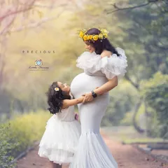 Welcoming a new baby is a family affair. I love including older siblings in my maternity shoots to capture their excitement and the growing family bond, creating precious keepsakes for everyone.