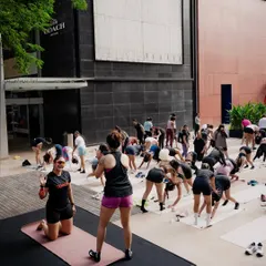 A view from the stage at a Nike yoga event. It's a joy to see so many people from the community coming together to practice outdoors.
