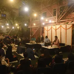 A view of the audience at The Courtyard, completely absorbed in the music under the evening lights. This is the connection I strive for in every performance.