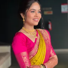 My bride Shrishti's radiant smile during her vidhi ceremony. Her natural, glowing makeup enhances her happiness.