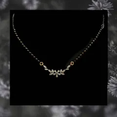 A delicate mangalsutra with a floral-inspired diamond cluster. This lightweight design adds a touch of sparkle without being overpowering.