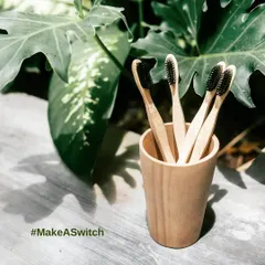 Make a simple switch with our bamboo toothbrushes. Set against a natural green backdrop, these toothbrushes feature biodegradable bamboo handles and charcoal-infused bristles, representing a small but significant step away from plastic waste.