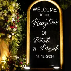 First impressions are everything. We designed this gorgeous illuminated welcome signage, framed with lush florals, to give guests a regal and personal welcome to the reception.