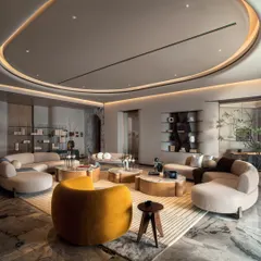 This living room in a modern-minimalist apartment at Palais Royale unfolds as a serene sanctuary, elevated by panoramic views of the Arabian Sea. Defined by a monochrome palette and softened with tempest white marble, the space sets a soothing tone where structure and soul coexist beautifully.