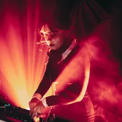 Lost in the music and the red haze during my Halloween DJ set. The lighting and atmosphere are key elements I produce to create a specific mood, whether it's spooky, energetic, or ethereal.