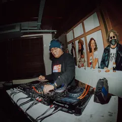 Focused on the mix. A good DJ set is a journey, and I take pride in crafting a seamless flow of beats and grooves for the crowd.