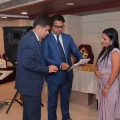 Going over the event schedule with the organizers. Behind every smooth event is careful planning and coordination, ensuring every detail is perfect.