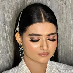 A glimpse of the makeup in the making. This soft, rosy look was built layer by layer to create a seamless and glowing finish.