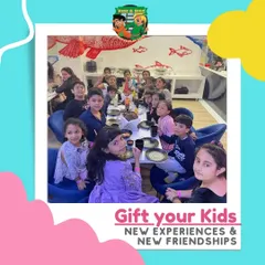 A group of children enjoying a meal together in our cafe seating area. The space is designed to be comfortable for group lunches during parties or playdates.