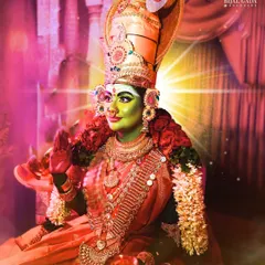 A divine portrait of the Devi Maa look, radiating light and power. The makeup, crown, and jewelry all come together to create a vision of the goddess.