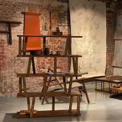 A collection of wooden furniture and textile art from the 'Intersection' exhibit. Our curation brought together the work of various artists and designers to explore the space between objects and art.