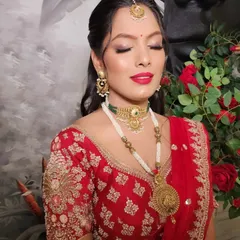 A closer look at the eye makeup for this party look. The soft shimmer on the lids and defined lash line make the eyes pop without being too heavy.