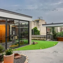 Another perspective of the Aligarh project, highlighting the modern architectural lines of the indoor gym and its connection to the outdoor landscape. The design ensures that even functional spaces feel integrated and luxurious.